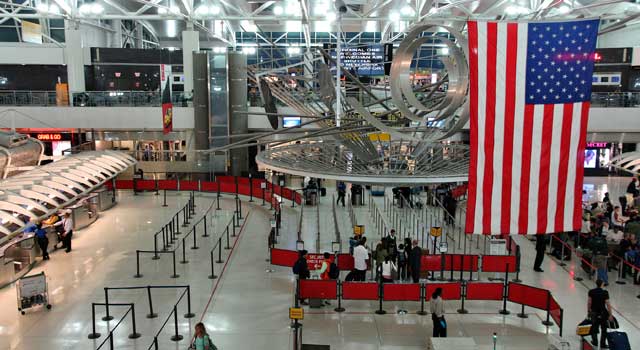 Where do international flights arrive at JFK International Airport?